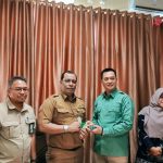 Penyerahan Kartu Peserta BPJS Kabupaten Natuna